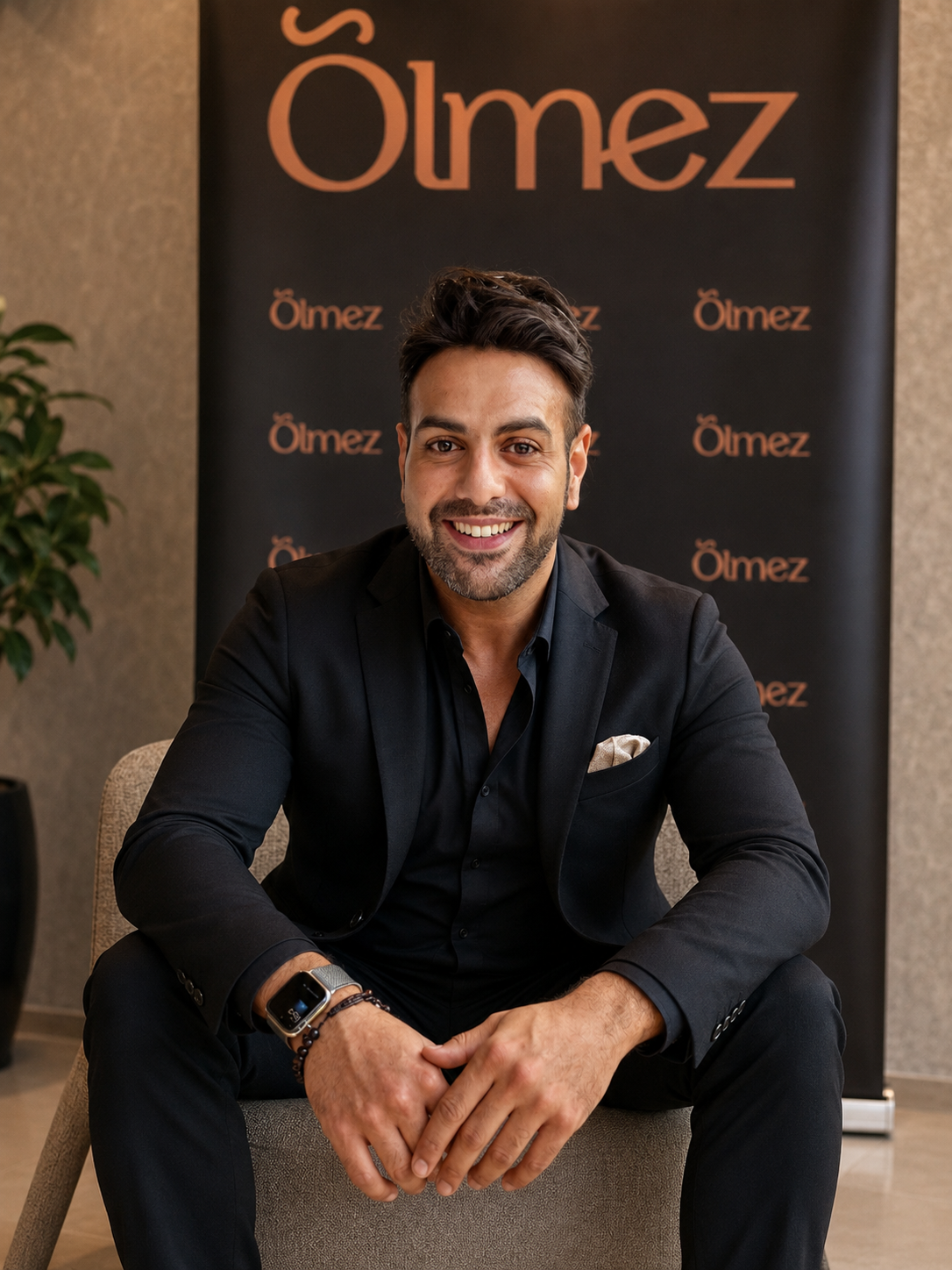 Founder portrait against the warm copper Ölmez backdrop